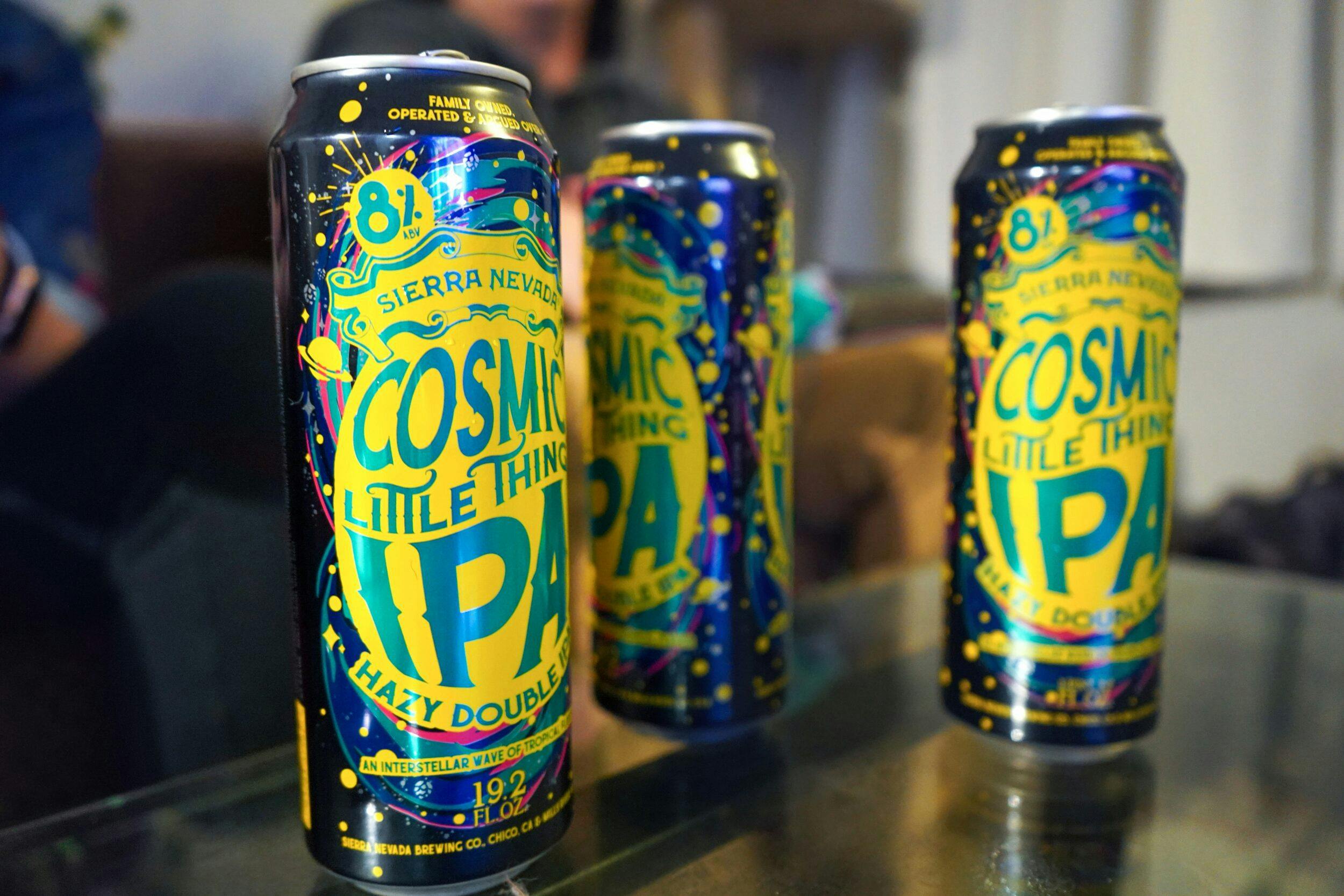 Cosmic Little Thing cans on bar counter