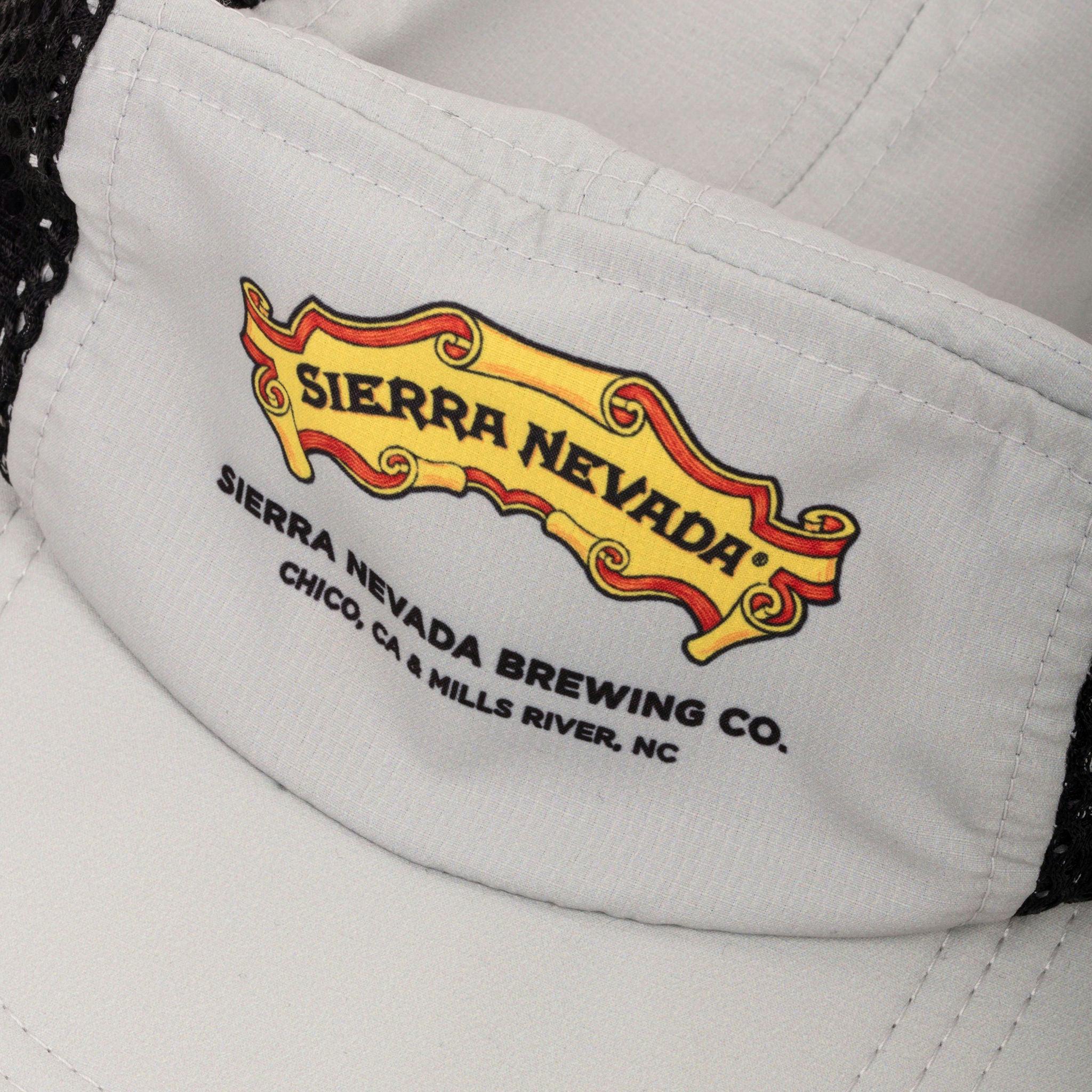 Sierra Nevada Brewing Co. Camper Hat - closeup view of the printed Sierra Nevada scroll logo on the front of the hat