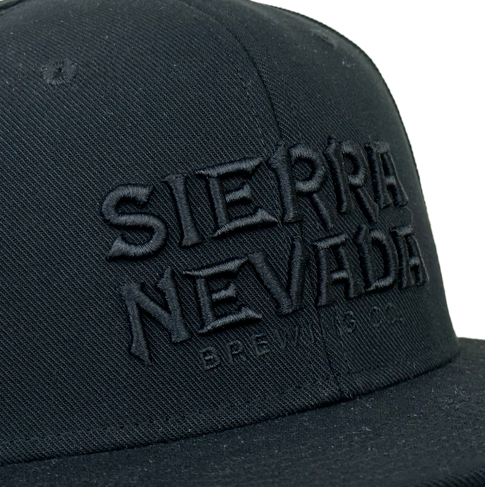 Sierra Nevada Stacked Text Hat Black - closeup shot of the embroidered text logo on the front of the hat
