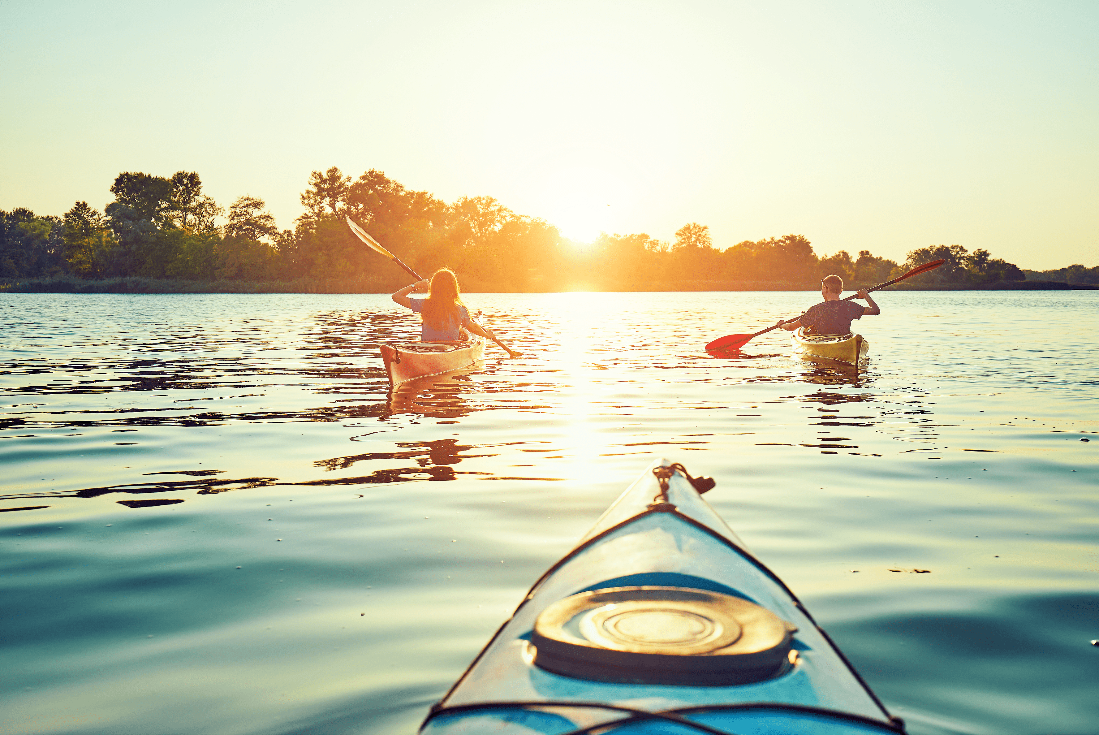 Canoe on the lake at sunset