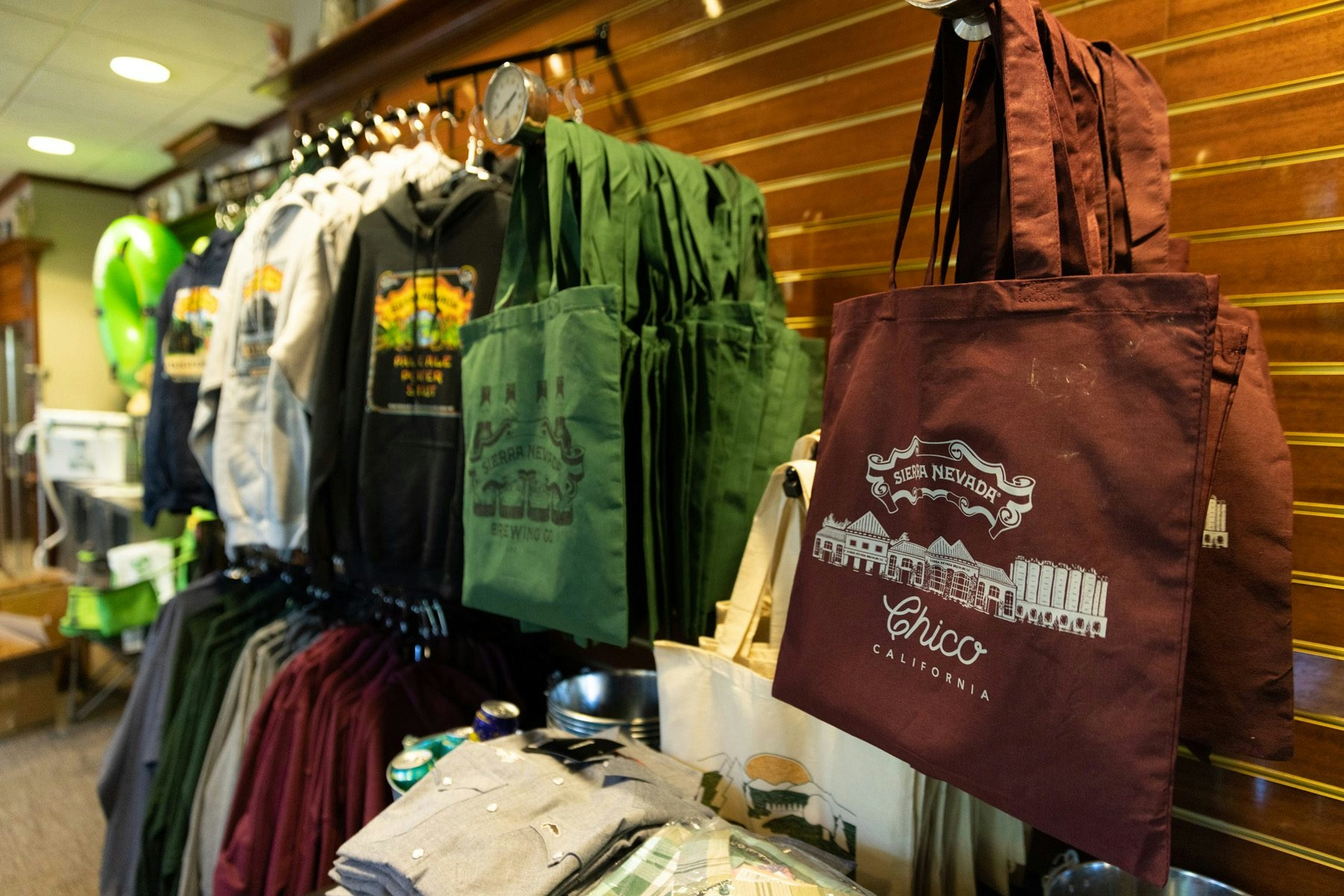 Tote bags and other merch inside the Sierra Nevada Brewing Co. gift shift in Chico, California
